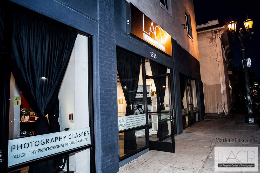 Storefront of LACP at night, 1515 Wilcox Ave.